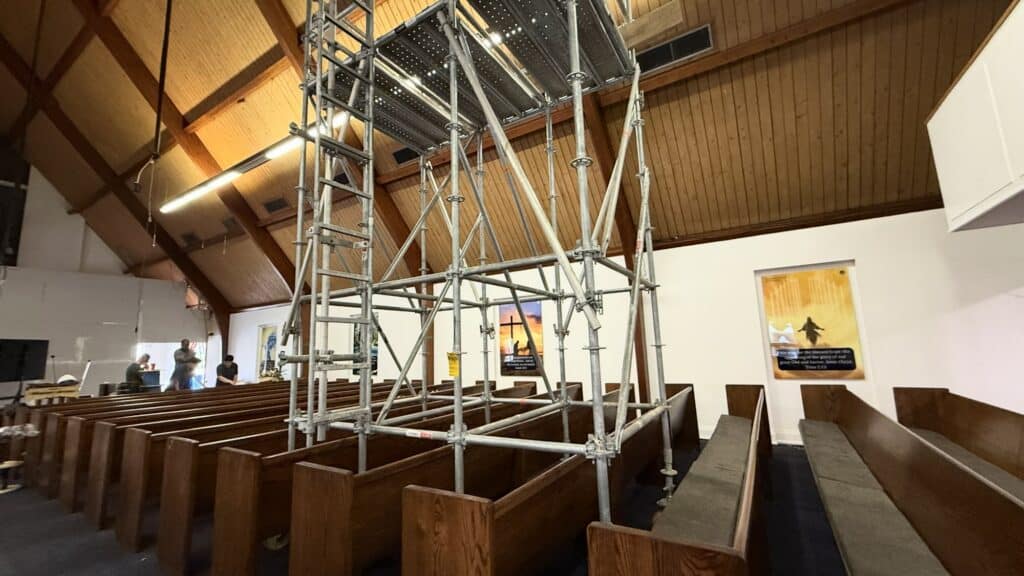Scaffold on top of the pews